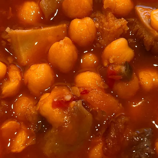 Cap i pota (Catalan calf’s head and trotter stew) with chickpeas, close up