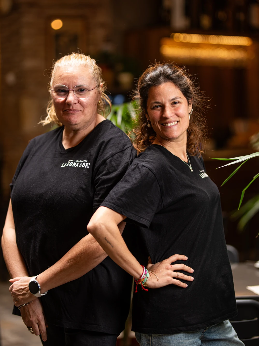 Celsa and her daughter Débora, of La Bona Sort, in the dining room