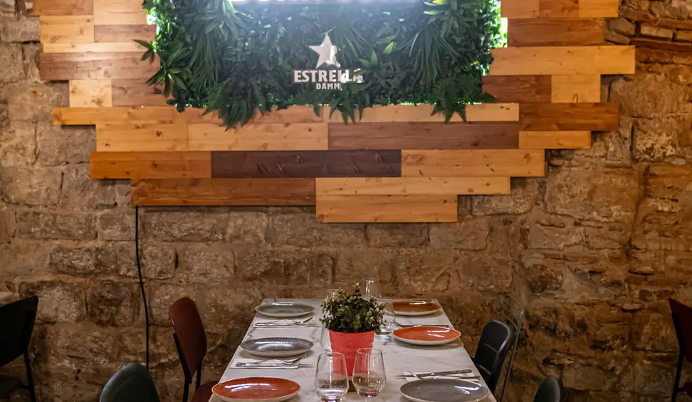 The La Bona Sort dining room, with stone and wood walls